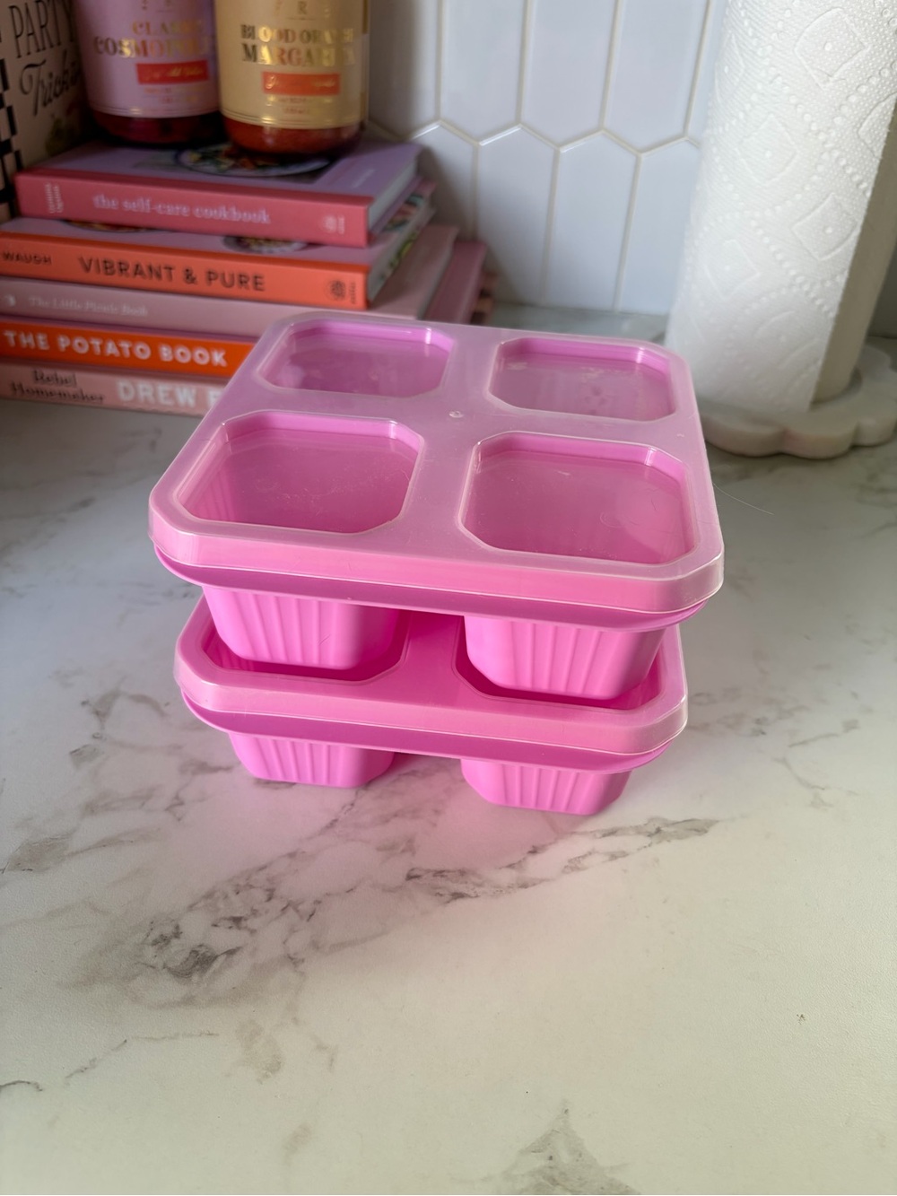 2 pink plastic snackle boxes